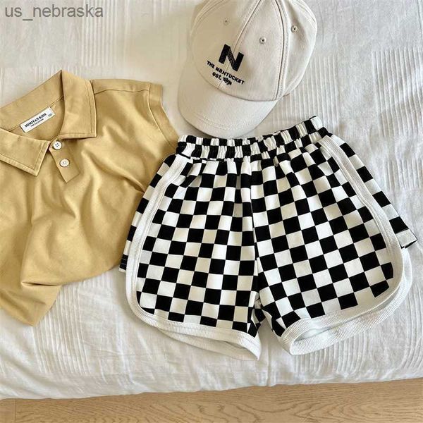 children's shorts 2022 summer new boys and girls black and white plaid casual pants baby chessboard plaid fashion brand pants l230518, Blue
children's shorts 2022 summer new boys and girls black and white plaid casual pants baby chessboard plaid fashion brand pants l230518, Blue