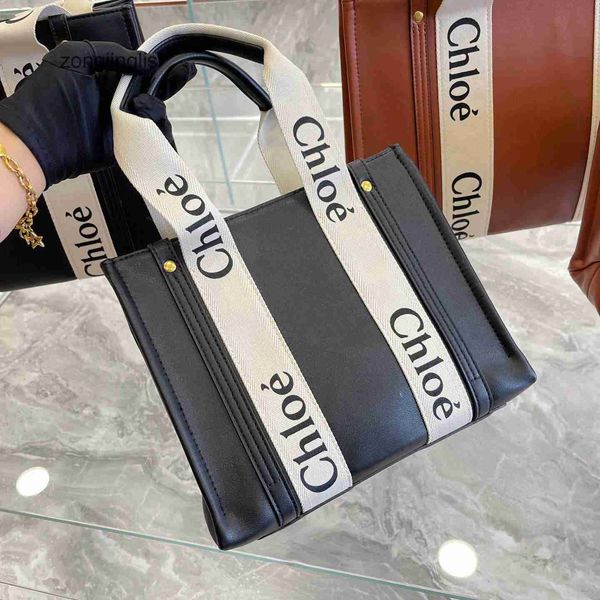cloe hands woody outlet tote handbag minority bag bags designer women's 2023 canvas tote large capacity foreign style portable fashion
cloe hands woody outlet tote handbag minority bag bags designer women's 2023 canvas tote large capacity foreign style portable fashion