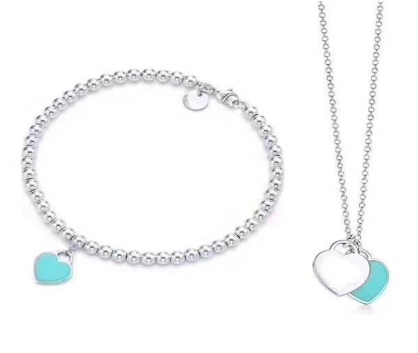 2019 women silver thin beads blue silver heart plate stainless steel pendant necklaces and bracelet suit with box and2929938
2019 women silver thin beads blue silver heart plate stainless steel pendant necklaces and bracelet suit with box and2929938