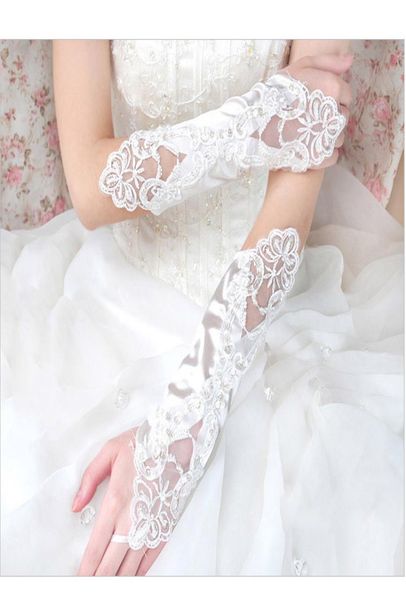 2020 new arrival wedding accessories long beading elbow length bridal gloves appliques lace fingerless wedding gloves1755936, White
2020 new arrival wedding accessories long beading elbow length bridal gloves appliques lace fingerless wedding gloves1755936, White