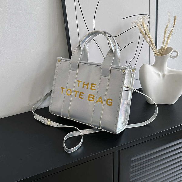 the tote bag 2023 new women's bag fashion one shoulder crossbody bag pearlescent handheld tote bag
the tote bag 2023 new women's bag fashion one shoulder crossbody bag pearlescent handheld tote bag