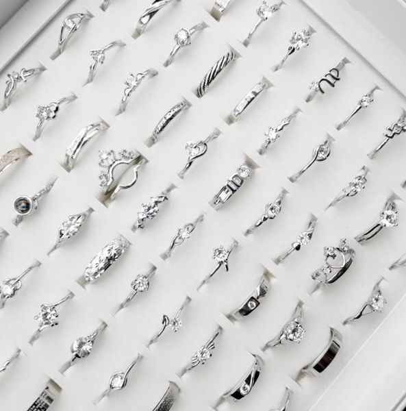whole 100pcs sparkling silver rings fashion simple women039s wedding band rings mixed style gift party engagement jewelry3676897
whole 100pcs sparkling silver rings fashion simple women039s wedding band rings mixed style gift party engagement jewelry3676897