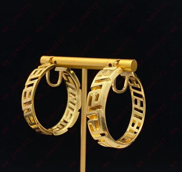 

hoop & huggie gold vintage hollow plain back interlocking pattern large circle earrings, jewelry designers design simple individual pieces,, Golden;silver