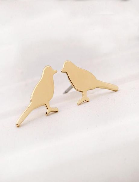 selling new glossy surface cute little bird sparrow earring silver gold rose gold color copper material for kids fashion jewel3664177, Golden;silver
selling new glossy surface cute little bird sparrow earring silver gold rose gold color copper material for kids fashion jewel3664177, Golden;silver
