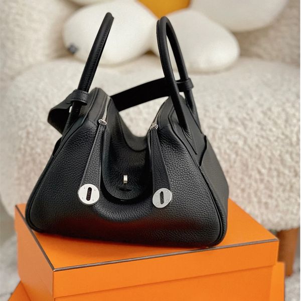 premium cowhide doctor bag: lychee pattern bag - versatile carrying options, single shoulder & hand carry, iconic pillbox style, pillow shap
premium cowhide doctor bag: lychee pattern bag - versatile carrying options, single shoulder & hand carry, iconic pillbox style, pillow shap