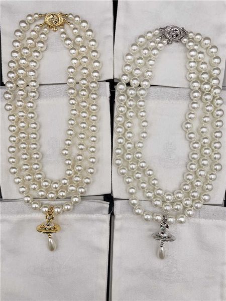 western empress dowager vivian gold silver layer knot pearl three dimensional saturn necklace -- b8072
western empress dowager vivian gold silver layer knot pearl three dimensional saturn necklace -- b8072