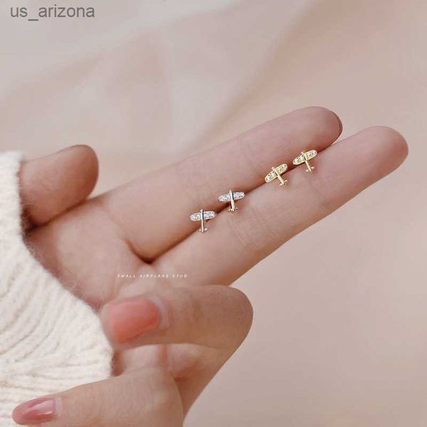 stylish exquisite pave zircon mini aircraft airplane small studs earrings for women girls elegant temperament fashion jewelry l230620, Golden;silver
stylish exquisite pave zircon mini aircraft airplane small studs earrings for women girls elegant temperament fashion jewelry l230620, Golden;silver