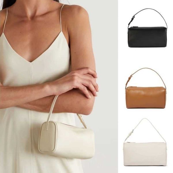 the * row 90s pencil case wrap head layer cowhide simple and premium feel penholder wrap underarm handbag
the * row 90s pencil case wrap head layer cowhide simple and premium feel penholder wrap underarm handbag