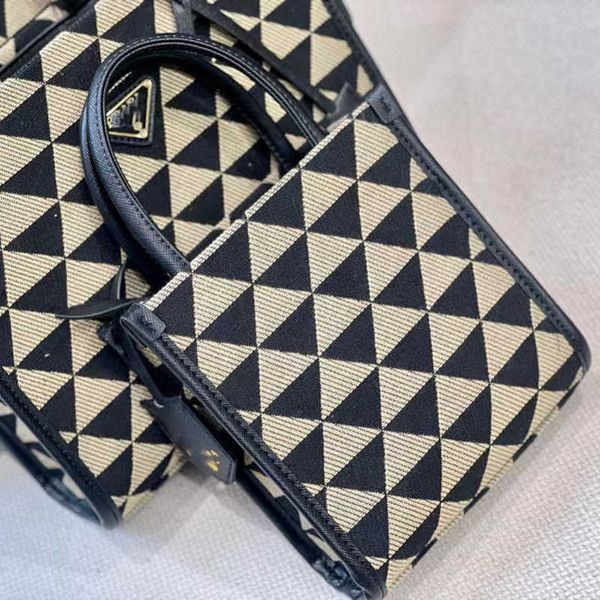 2023 factory direct sales family prad women's new triangle emboidered tote shopping bag handbag 1
2023 factory direct sales family prad women's new triangle emboidered tote shopping bag handbag 1