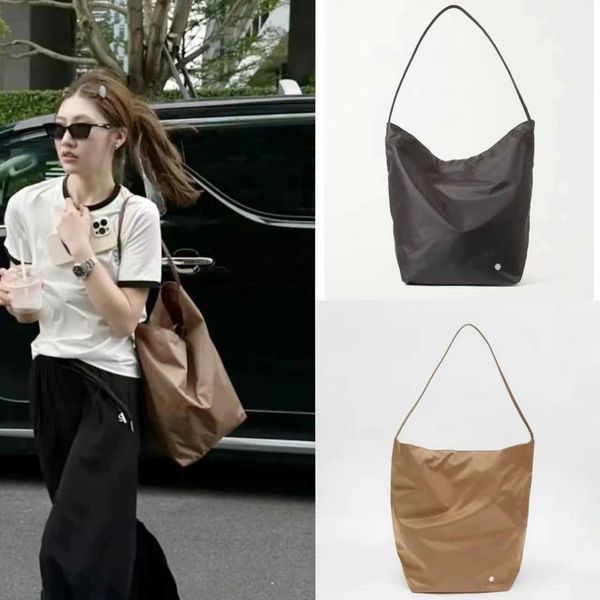 the * row new nylon cloth parktote bucket bag with small design large capacity one shoulder handheld tote bag
the * row new nylon cloth parktote bucket bag with small design large capacity one shoulder handheld tote bag