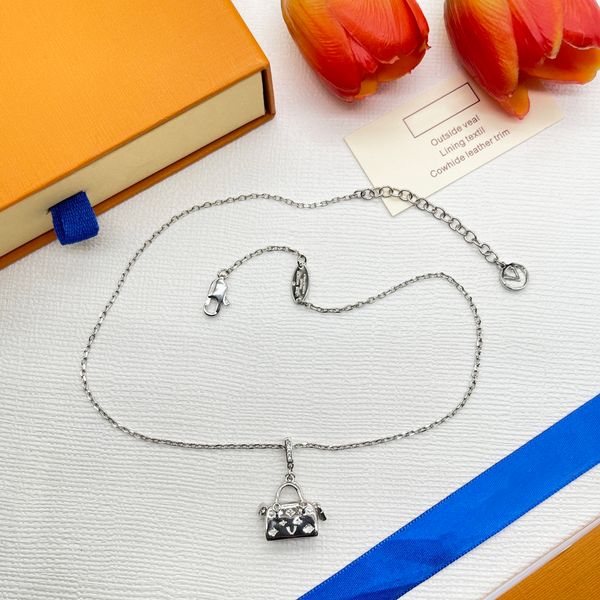 designer necklace silver handbag pendant for woman trendy stainless steel chain necklaces festive gift fashion jewelry for girl
designer necklace silver handbag pendant for woman trendy stainless steel chain necklaces festive gift fashion jewelry for girl