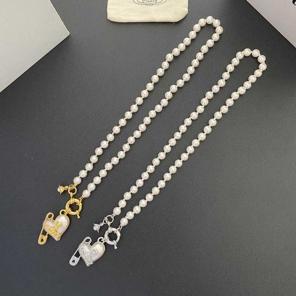 empress dowager xi's new pearl love pin saturn peach heart light luxury and high sense small group necklace, Silver
empress dowager xi's new pearl love pin saturn peach heart light luxury and high sense small group necklace, Silver