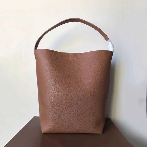 the row bucket bag genuine leather large capacity commuter tote bag litchi pattern cowhide one shoulder handbag versatile for women
the row bucket bag genuine leather large capacity commuter tote bag litchi pattern cowhide one shoulder handbag versatile for women