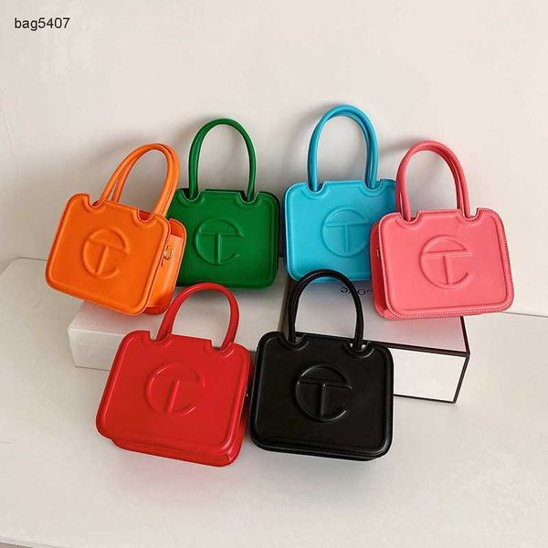 new bags 75% factory direct sales or retailfashion simple portable shopping women's new small square bag candy color single shoulder ms
new bags 75% factory direct sales or retailfashion simple portable shopping women's new small square bag candy color single shoulder ms