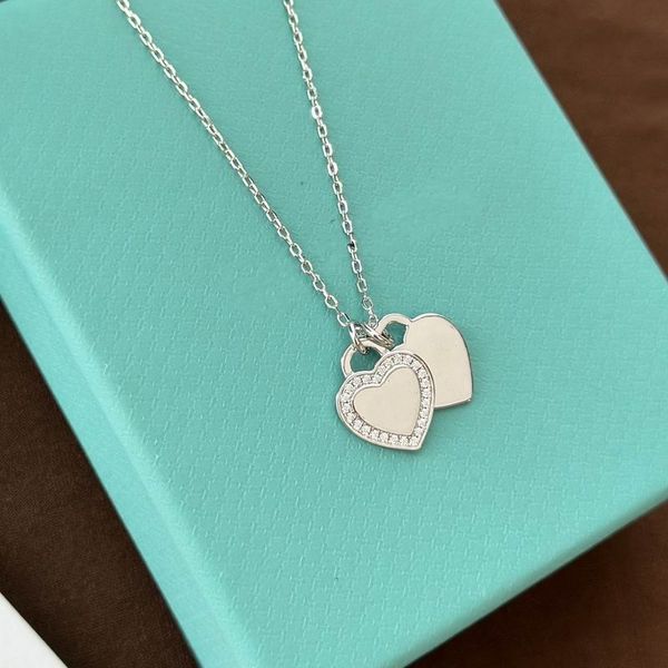 2023 lovely cute pendant necklaces long silver thin stainless steel chain two diamonds heart design women necklace with dust bag and box
2023 lovely cute pendant necklaces long silver thin stainless steel chain two diamonds heart design women necklace with dust bag and box