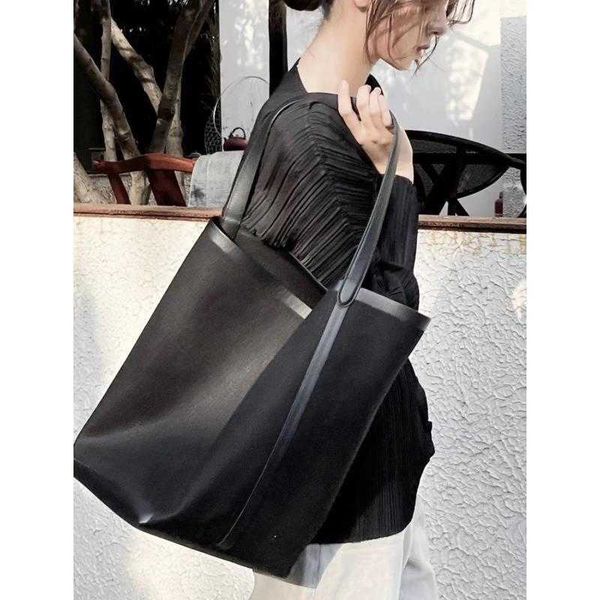 the row canvas bag cotton hemp splice cowhide one shoulder simple fashion bucket bag casual tote bag the row bag
the row canvas bag cotton hemp splice cowhide one shoulder simple fashion bucket bag casual tote bag the row bag