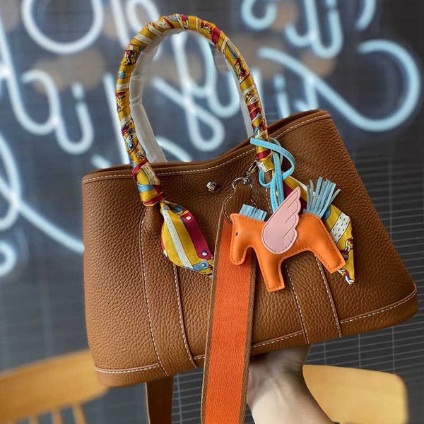 classic garden party tote bag new 2023 genuine leather women's litchi pattern head layer cowhide fashion handheld for womenervn
classic garden party tote bag new 2023 genuine leather women's litchi pattern head layer cowhide fashion handheld for womenervn
