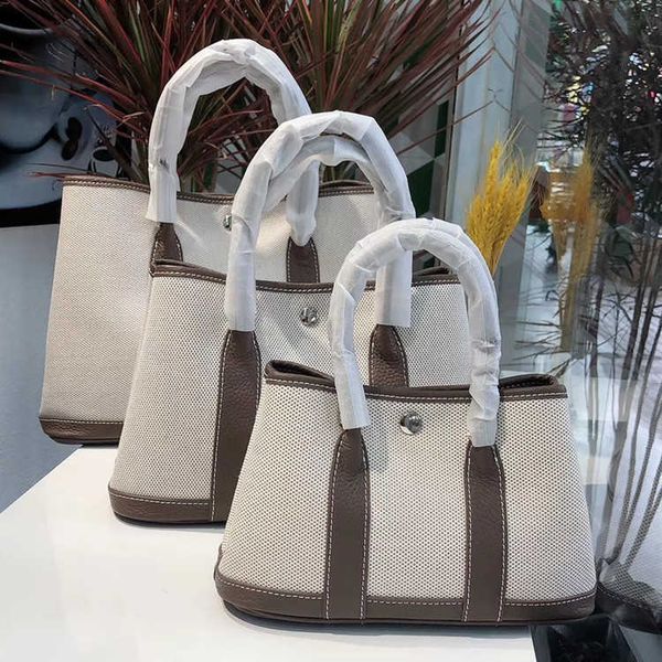 classic garden party tote bag cowhide canvas one shoulder crossbody portable business commuter leisure versatile large capacity female fashi
classic garden party tote bag cowhide canvas one shoulder crossbody portable business commuter leisure versatile large capacity female fashi