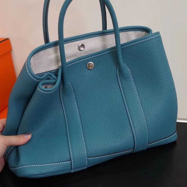 classic garden party tote bag 2023 new leather women's bag portable garden large capacity litchi pattern togo classic versatile xq4r
classic garden party tote bag 2023 new leather women's bag portable garden large capacity litchi pattern togo classic versatile xq4r