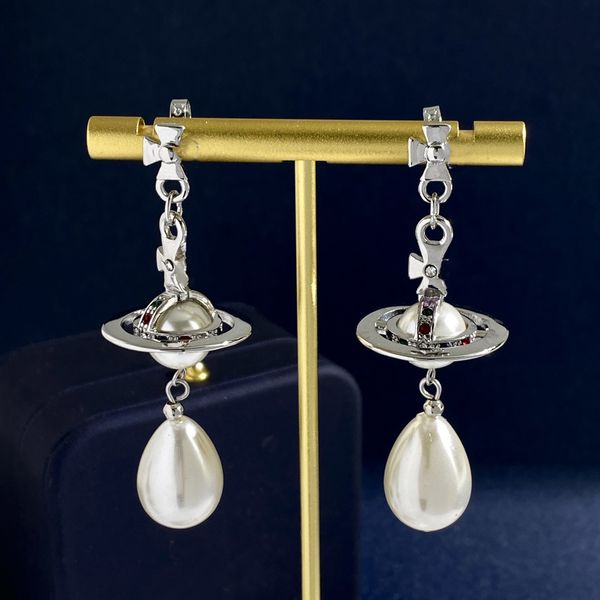 woman stud designer earrings gold hoop earing vivian orecchini luxury women pearl saturn earings jewelry westwood 39, Golden;silver
woman stud designer earrings gold hoop earing vivian orecchini luxury women pearl saturn earings jewelry westwood 39, Golden;silver