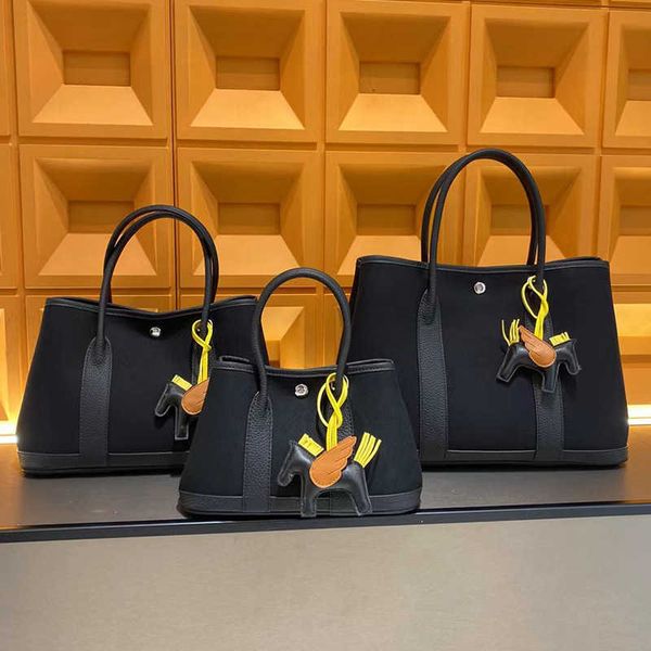 classic garden party tote bag leather premium genuine canvas 2023 new contrast color women's commuter casual one shoulder handbags35k
classic garden party tote bag leather premium genuine canvas 2023 new contrast color women's commuter casual one shoulder handbags35k