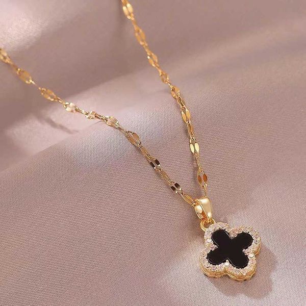 black and white double faced four leaf grass necklace female fashion inlaid diamond advanced design sense wild red net pendant jewelry
black and white double faced four leaf grass necklace female fashion inlaid diamond advanced design sense wild red net pendant jewelry
