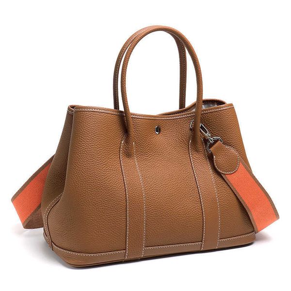 classic garden party tote bag cowhide large capacity women's bag with single shoulder and diagonal span simple garden handbag leather s
classic garden party tote bag cowhide large capacity women's bag with single shoulder and diagonal span simple garden handbag leather s