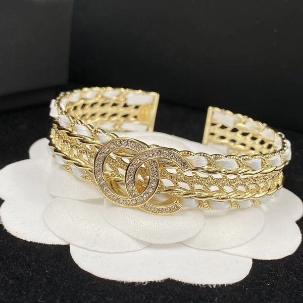 cuff alphabet metal diamond-encrusted white leather woven wide version half opening bracelet, designer jewelry, women's personality fas
cuff alphabet metal diamond-encrusted white leather woven wide version half opening bracelet, designer jewelry, women's personality fas