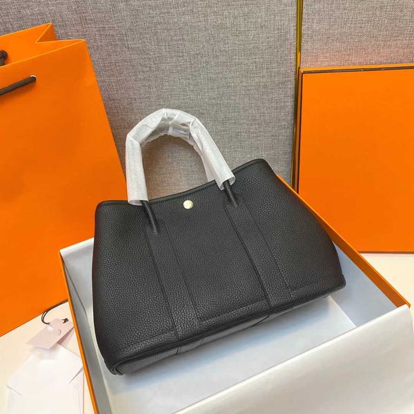 classic garden party tote bag lychee new togo grain leather garden bag fashion shopping portable women's large capacity iadw
classic garden party tote bag lychee new togo grain leather garden bag fashion shopping portable women's large capacity iadw