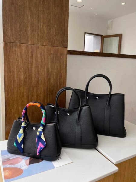 classic garden party tote bag new leather women's bag one shoulder diagonal simple garden handheld shopping bucket68rl
classic garden party tote bag new leather women's bag one shoulder diagonal simple garden handheld shopping bucket68rl