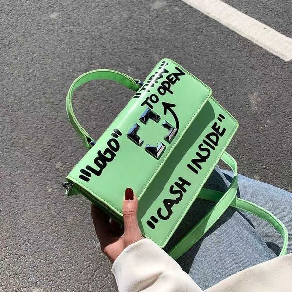 fashion bag designer handbag wallet graffiti letter personality arrow small square bag new casual handheld luxury shoulder crossbody women&#
fashion bag designer handbag wallet graffiti letter personality arrow small square bag new casual handheld luxury shoulder crossbody women&#