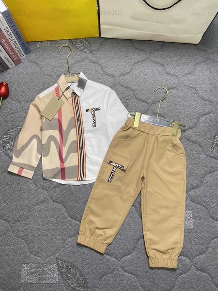 2023 designer baby suits autumn set tracksuits size 100-150 cm 2pcs patchwork lapel long sleeve shirt and khaki pants, White
2023 designer baby suits autumn set tracksuits size 100-150 cm 2pcs patchwork lapel long sleeve shirt and khaki pants, White