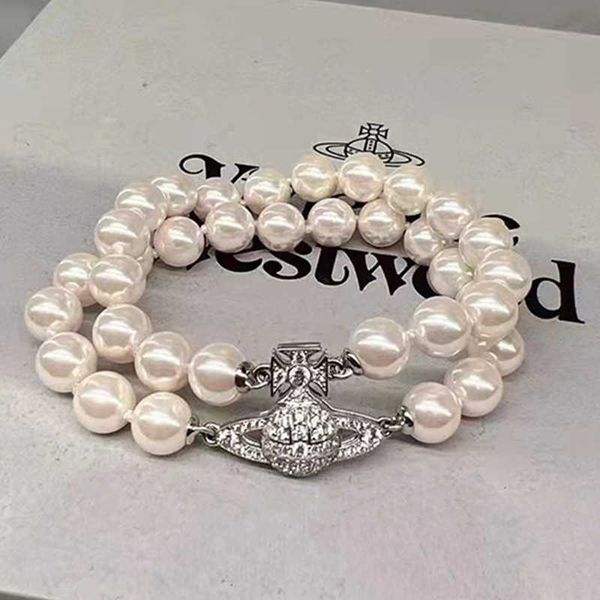 western empress dowager double layer bracelet vivian pearl saturn new shining full diamond magnetic buckle planet small handset, Golden;silver
western empress dowager double layer bracelet vivian pearl saturn new shining full diamond magnetic buckle planet small handset, Golden;silver
