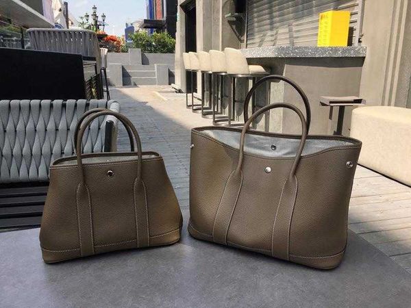 classic garden party tote bag autumn and winter togo layer cowhide garden bag senior sensitive commuter womens largecapacity leather handba
classic garden party tote bag autumn and winter togo layer cowhide garden bag senior sensitive commuter womens largecapacity leather handba