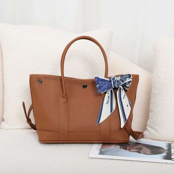 classic garden party tote bag bag large capacity garden genuine leather womens highend feeling simple and fashionable temperament handbag on
classic garden party tote bag bag large capacity garden genuine leather womens highend feeling simple and fashionable temperament handbag on