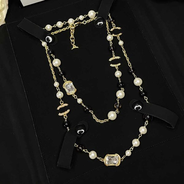 designer jewelry necklace autumn and winter long fragrant necklace fashion ol black white contrast pearl knot high edition spicy girl sweate
designer jewelry necklace autumn and winter long fragrant necklace fashion ol black white contrast pearl knot high edition spicy girl sweate