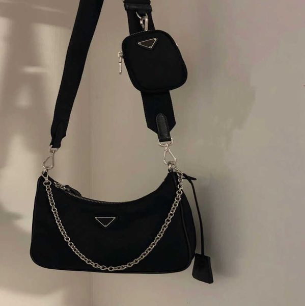 new luxury designer 2023 factory direct sales the correct version of hobo nylon piece set with box chain three in underarm one shoulder cros
new luxury designer 2023 factory direct sales the correct version of hobo nylon piece set with box chain three in underarm one shoulder cros