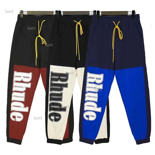 designer clothing casual pant rhude large letter printed contrast panel leggings high street fashion sports nylon drawstring pants 03, White;black
designer clothing casual pant rhude large letter printed contrast panel leggings high street fashion sports nylon drawstring pants 03, White;black