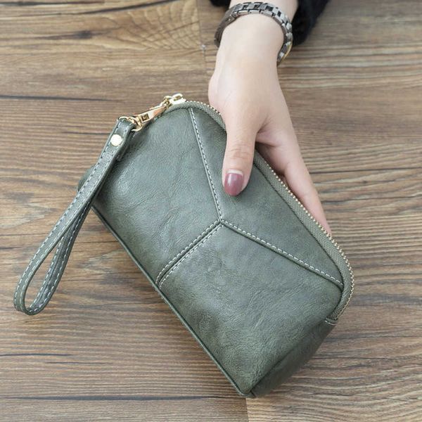 new and long women's bag simple and versatile handheld bag simple and small change handheld bag mobile bag
new and long women's bag simple and versatile handheld bag simple and small change handheld bag mobile bag