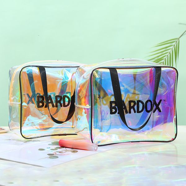 toiletry kits transparent colorful laser pvc cosmetic bag hand carry large capacity letter printing travel storage pouch 230729
toiletry kits transparent colorful laser pvc cosmetic bag hand carry large capacity letter printing travel storage pouch 230729