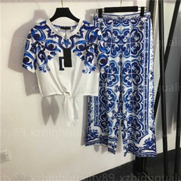 two piece pants tshirt set womens clothing round neck short sleeved white t-shirt high waisted print wide leg pant ladies suits designer wom
two piece pants tshirt set womens clothing round neck short sleeved white t-shirt high waisted print wide leg pant ladies suits designer wom