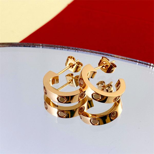 luxury brand designer stainless steel stud earrings for women love c shape hollow 18k gold bling diamond ear rings with shining crystal part, Golden;silver
luxury brand designer stainless steel stud earrings for women love c shape hollow 18k gold bling diamond ear rings with shining crystal part, Golden;silver
