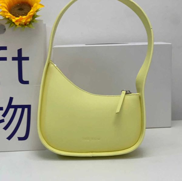 the row half moon bag in smooth leather women designer with flat shoulder strap and curved zipper closure clutch tote suded underarm bag
the row half moon bag in smooth leather women designer with flat shoulder strap and curved zipper closure clutch tote suded underarm bag