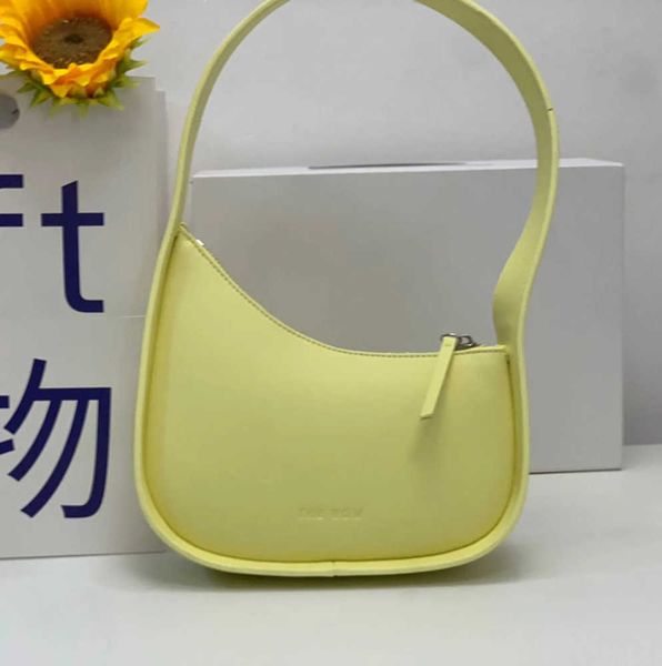 the row half moon bag in smooth leather women designer with flat shoulder strap and curved zipper closure clutch tote suded lining underarm
the row half moon bag in smooth leather women designer with flat shoulder strap and curved zipper closure clutch tote suded lining underarm