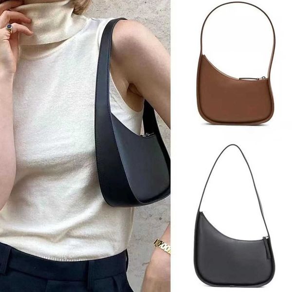 the row half moon bag in smooth leather women designer with flat shoulder strap and curved zipper closure clutch suded lining underarm bags
the row half moon bag in smooth leather women designer with flat shoulder strap and curved zipper closure clutch suded lining underarm bags