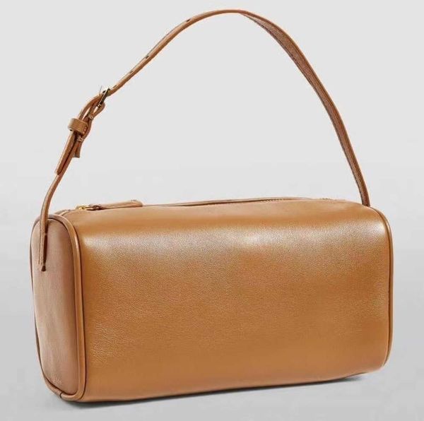 the row pen bag simple hand cowhide container mini premium touch bag
the row pen bag simple hand cowhide container mini premium touch bag