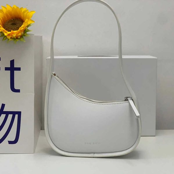 the row half moon bag in smooth leather women designer with flat shoulder strap and curved zipper closure clutch suded lining underarm bag
the row half moon bag in smooth leather women designer with flat shoulder strap and curved zipper closure clutch suded lining underarm bag