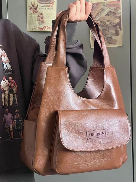 evening bags american vintage tote bag high capacity women s spring summer 2023 in shoulder brown luxury designer handbag 230729
evening bags american vintage tote bag high capacity women s spring summer 2023 in shoulder brown luxury designer handbag 230729
