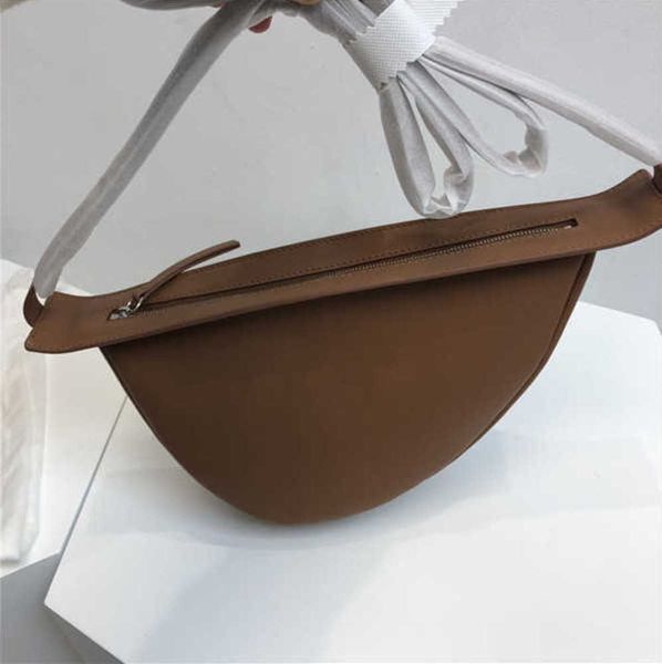 the row bag designer original fashion banana one shoulder crossbody saddle women's motorcycle european and american fashion
the row bag designer original fashion banana one shoulder crossbody saddle women's motorcycle european and american fashion