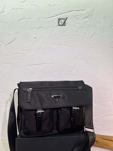 the latest black nylon men's messenger bag large capacity parachute nylon cloth messenger bag flip shoulder bag size:28*32cm #300
the latest black nylon men's messenger bag large capacity parachute nylon cloth messenger bag flip shoulder bag size:28*32cm #300